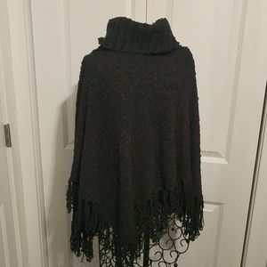 Black fringed poncho